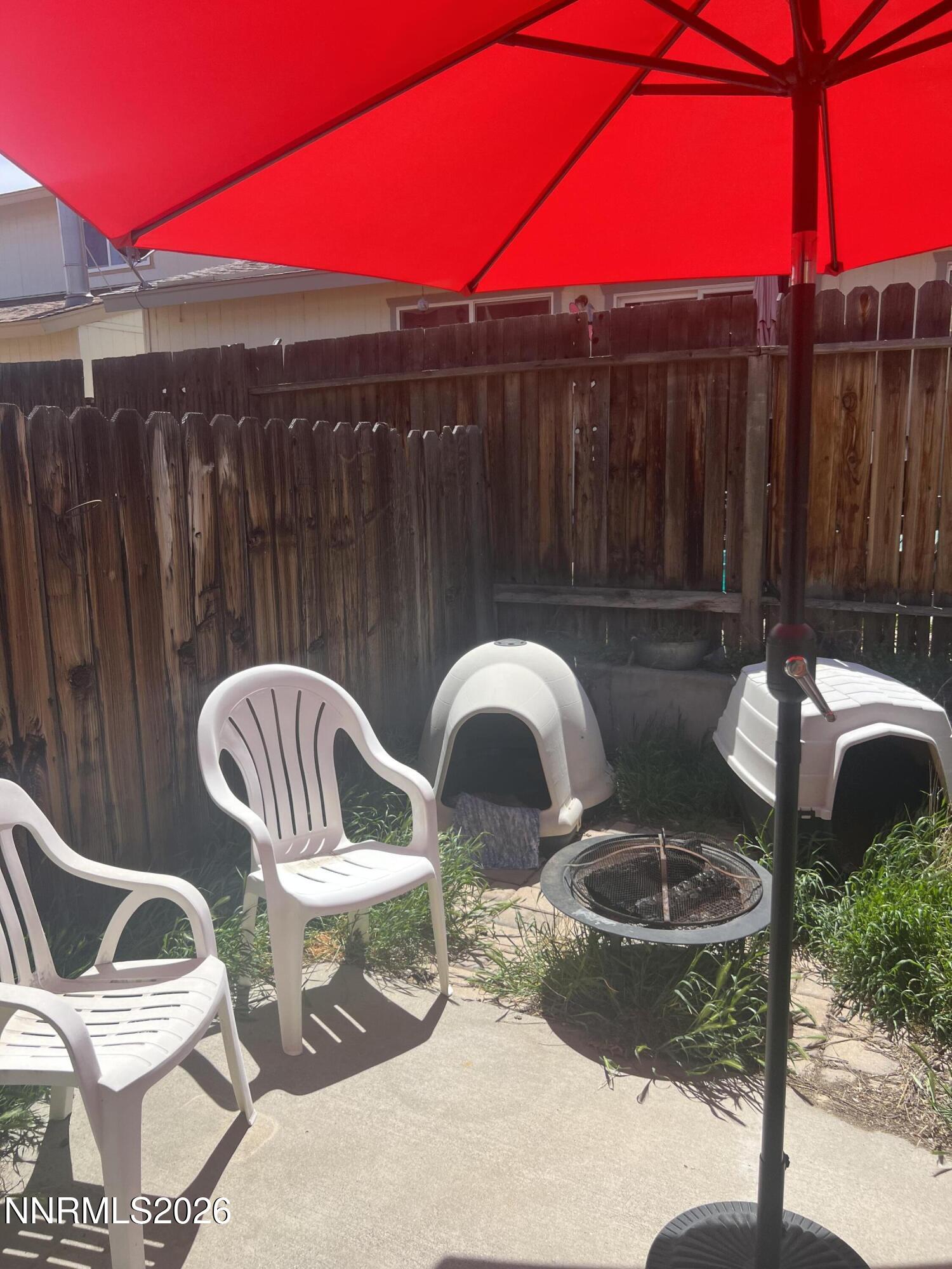 4263 Furgerson Ranch Road Carson City, NV 89701 - Photo 6 of 7 a backyard of a house with table and chairs