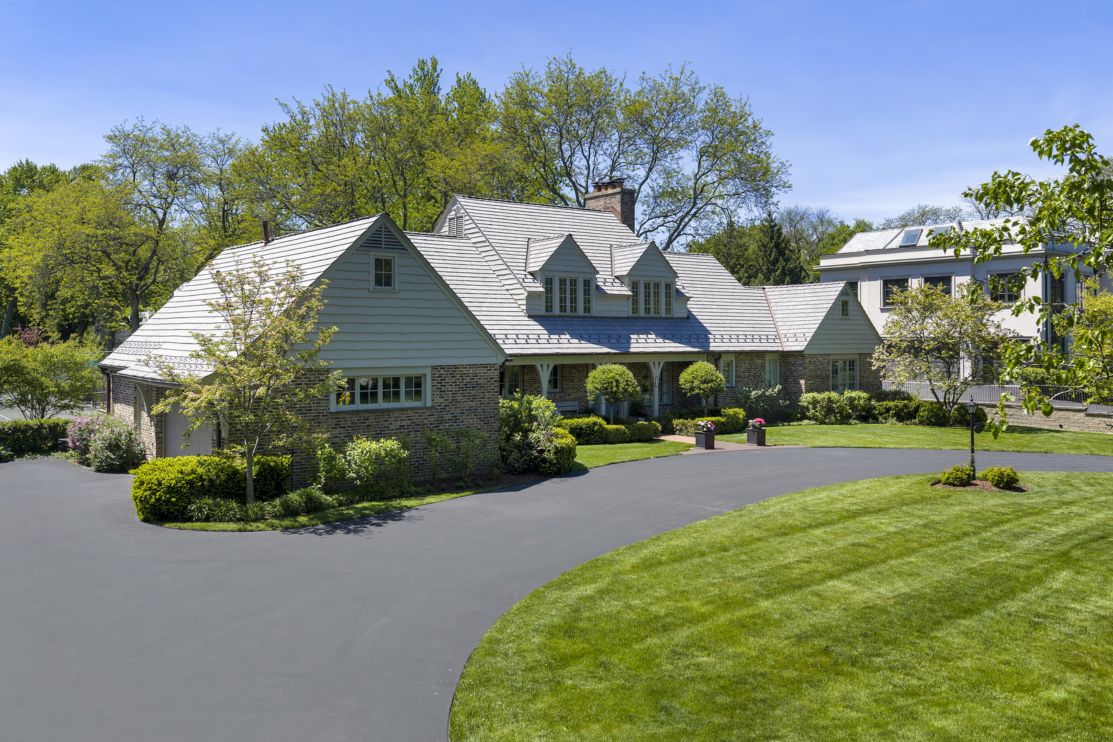 936 Sunset Road Winnetka, IL 60093 - Photo 50 of 50 a front view of house with yard and outdoor seating
