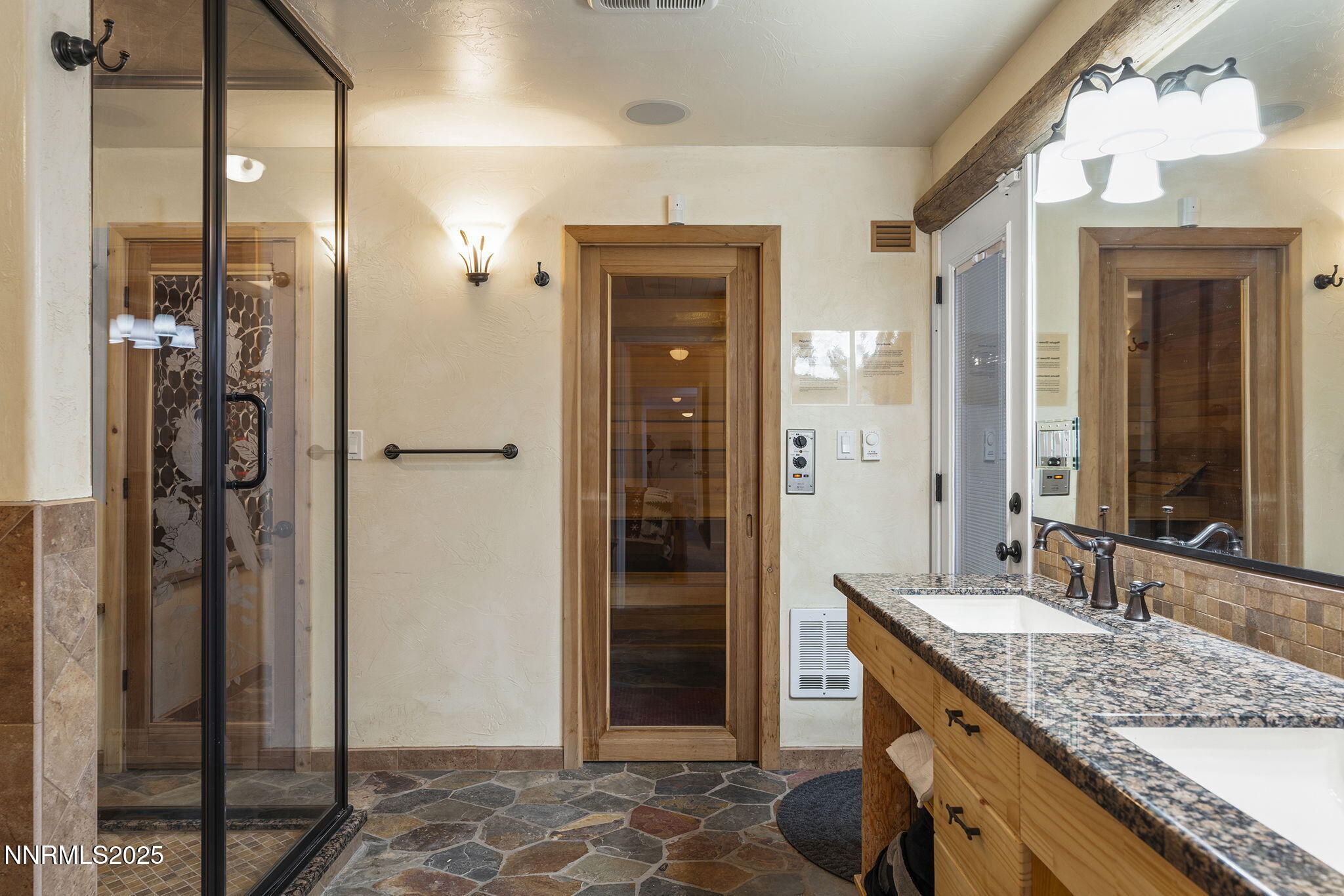 50 Sunridge Drive Reno, NV 89511 - Photo 15 of 29 a bathroom with a granite countertop sink and a mirror