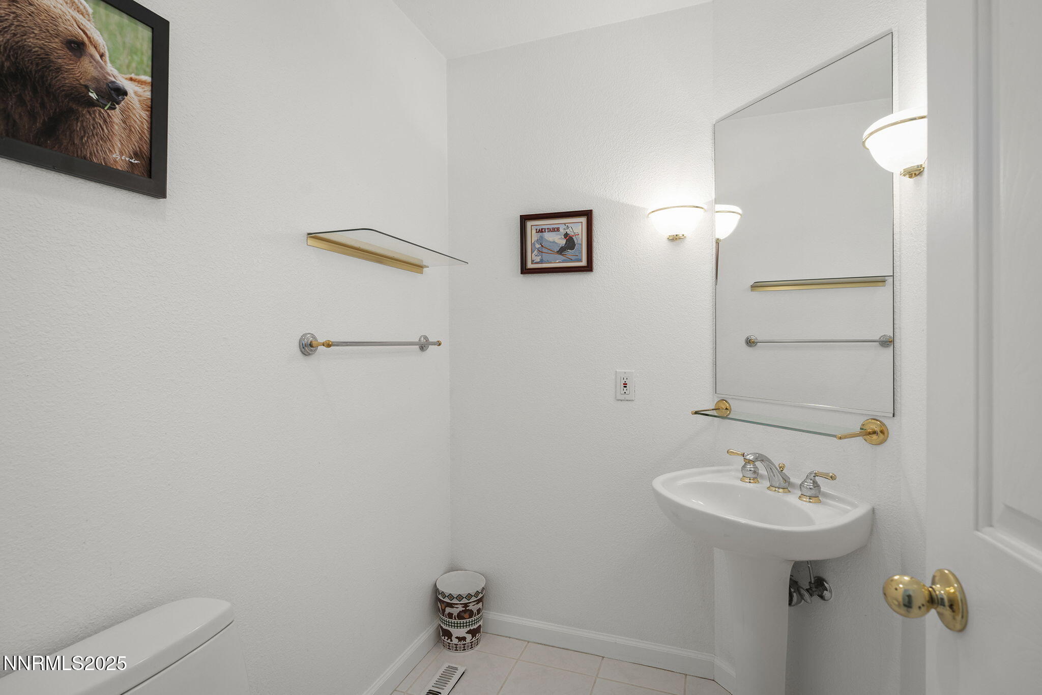 50 Sunridge Drive Reno, NV 89511 - Photo 22 of 29 a bathroom with a sink a toilet and mirror