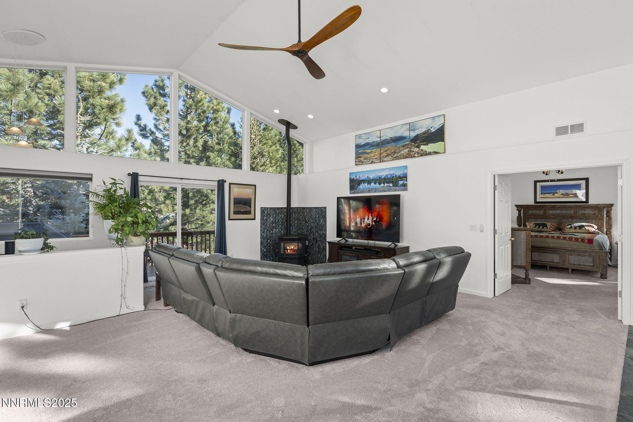 50 Sunridge Drive Reno, NV 89511 - Photo 4 of 29 a living room with furniture and a flat screen tv