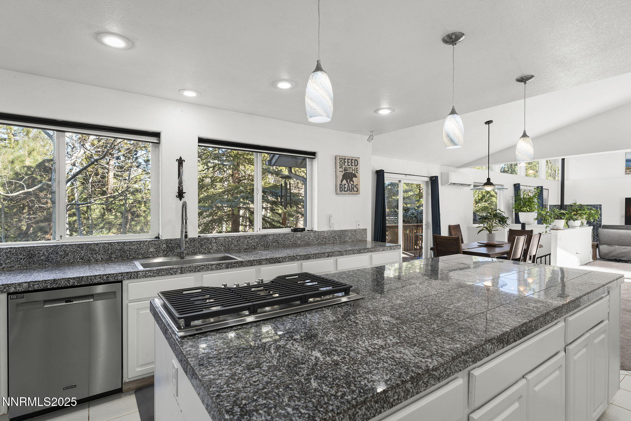50 Sunridge Drive Reno, NV 89511 - Photo 10 of 29 a kitchen with stainless steel appliances granite countertop a sink stove and cabinets