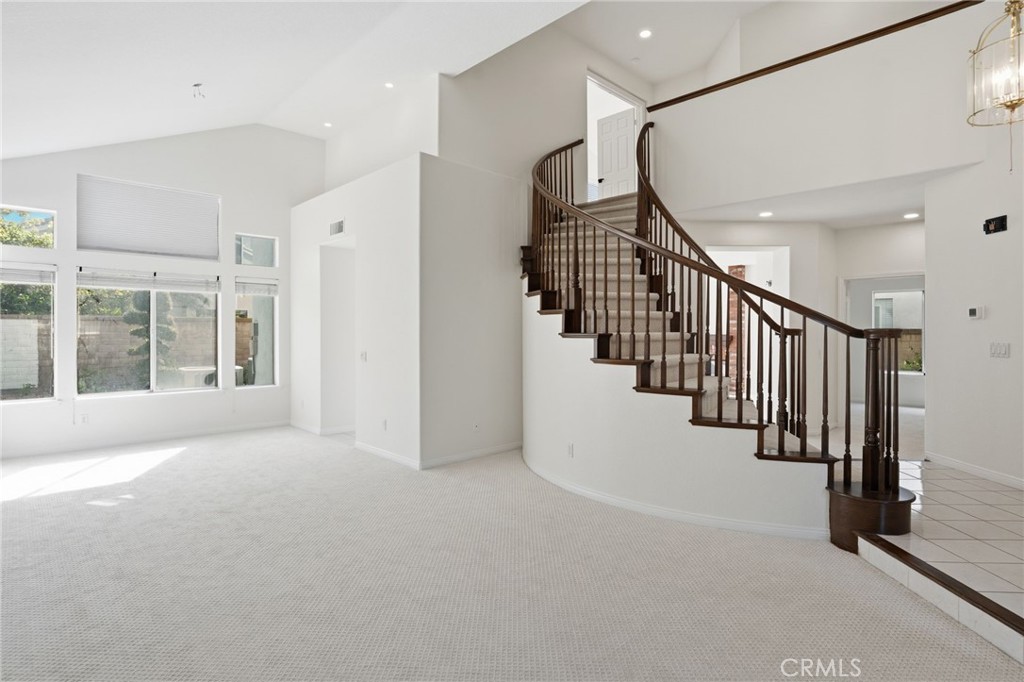 9916 Fonte Road Cypress, CA 90630 - Photo 4 of 27 a view of a hallway with windows