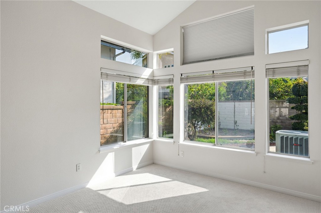 9916 Fonte Road Cypress, CA 90630 - Photo 5 of 27 a view of wooden floor and a window in a room