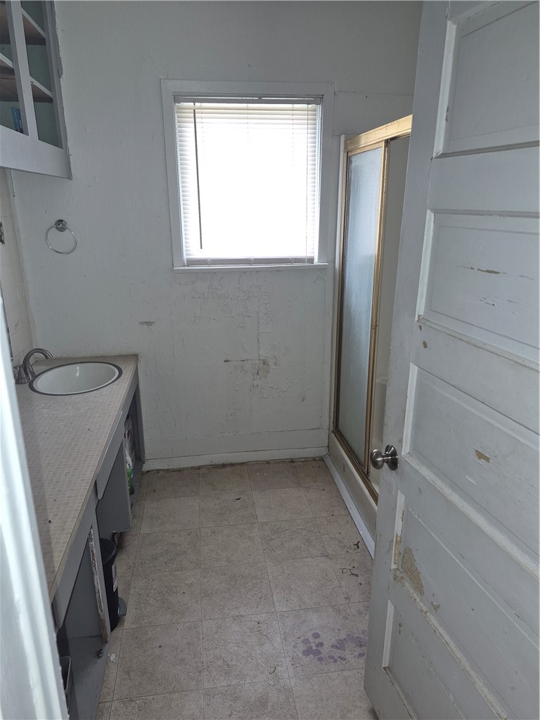 202 North Gregory Gregory, TX 78374 - Photo 13 of 19 a view of a room with window and closet