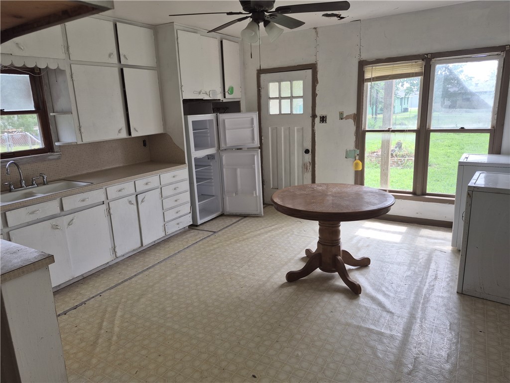 202 North Gregory Gregory, TX 78374 - Photo 9 of 19 a room with furniture and a window