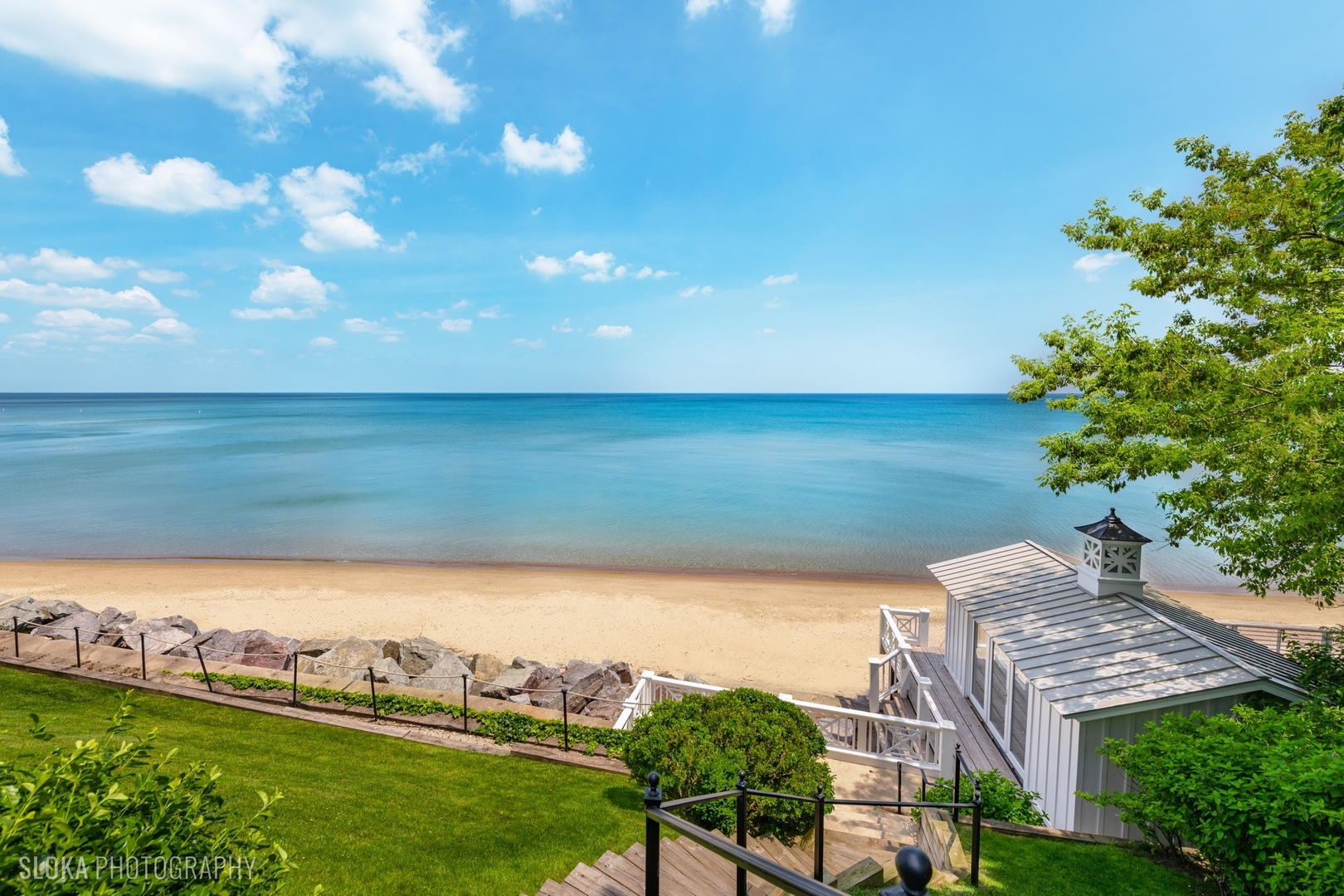 219 Sheridan Road Kenilworth, IL 60043 - Photo 52 of 63 a view of a lake with a yard