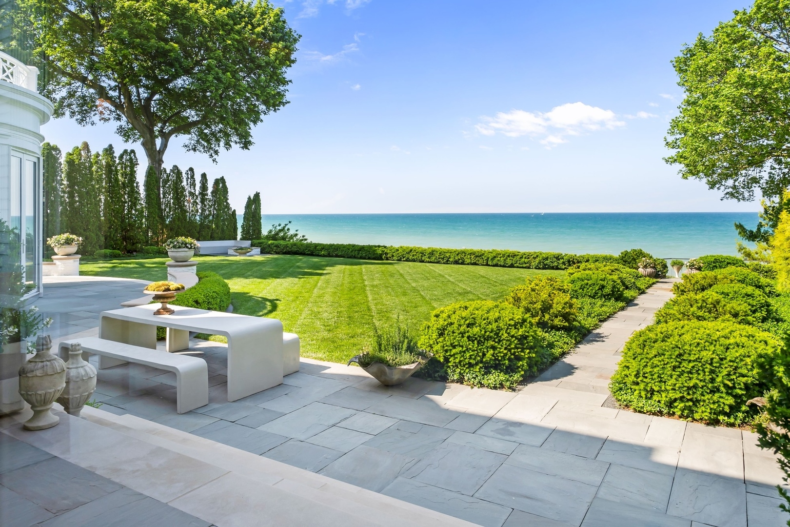 219 Sheridan Road Kenilworth, IL 60043 - Photo 10 of 63 a view of a patio with a ocean view