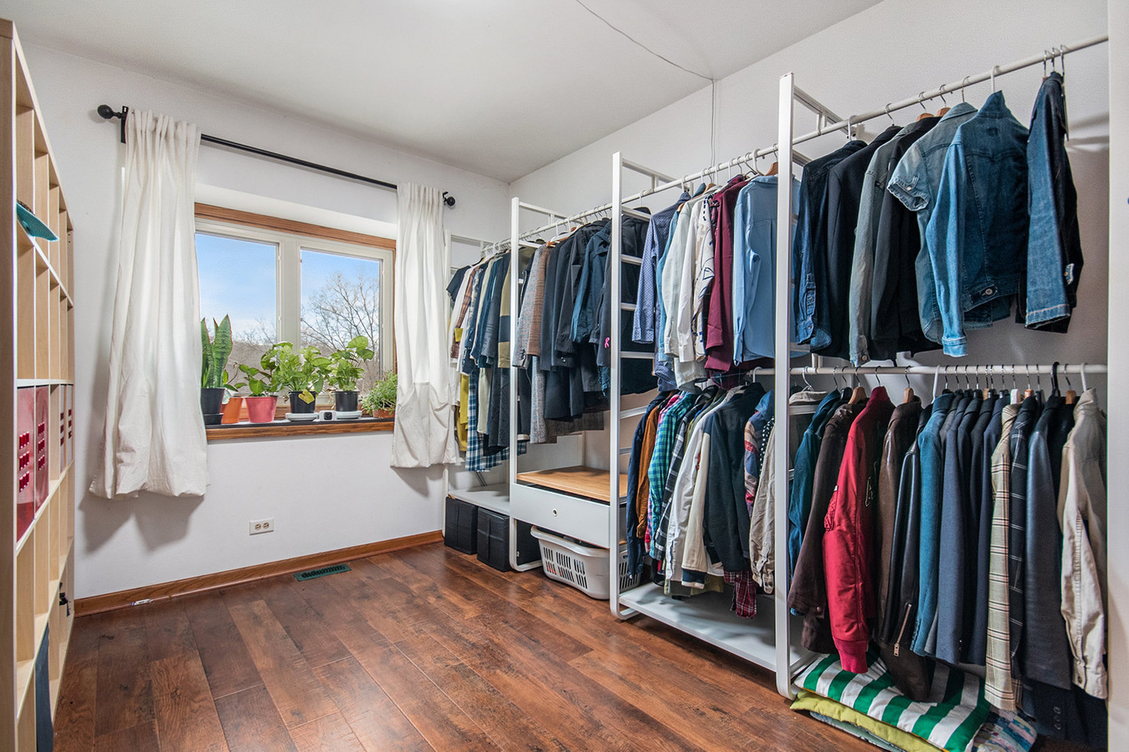 1008 Arbor Court Mount Prospect, IL 60056 - Photo 13 of 19 a view of walk in closet with clothes and shoes