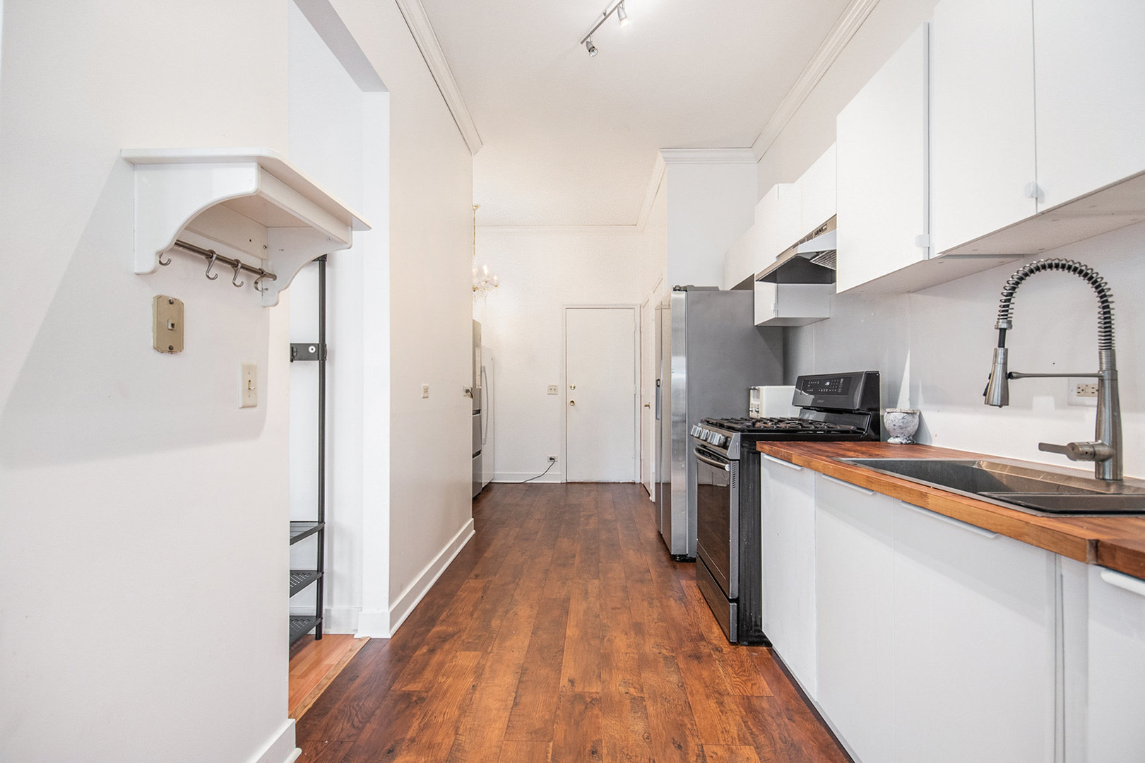 1008 Arbor Court Mount Prospect, IL 60056 - Photo 3 of 19 a kitchen with stainless steel appliances granite countertop a refrigerator and a sink