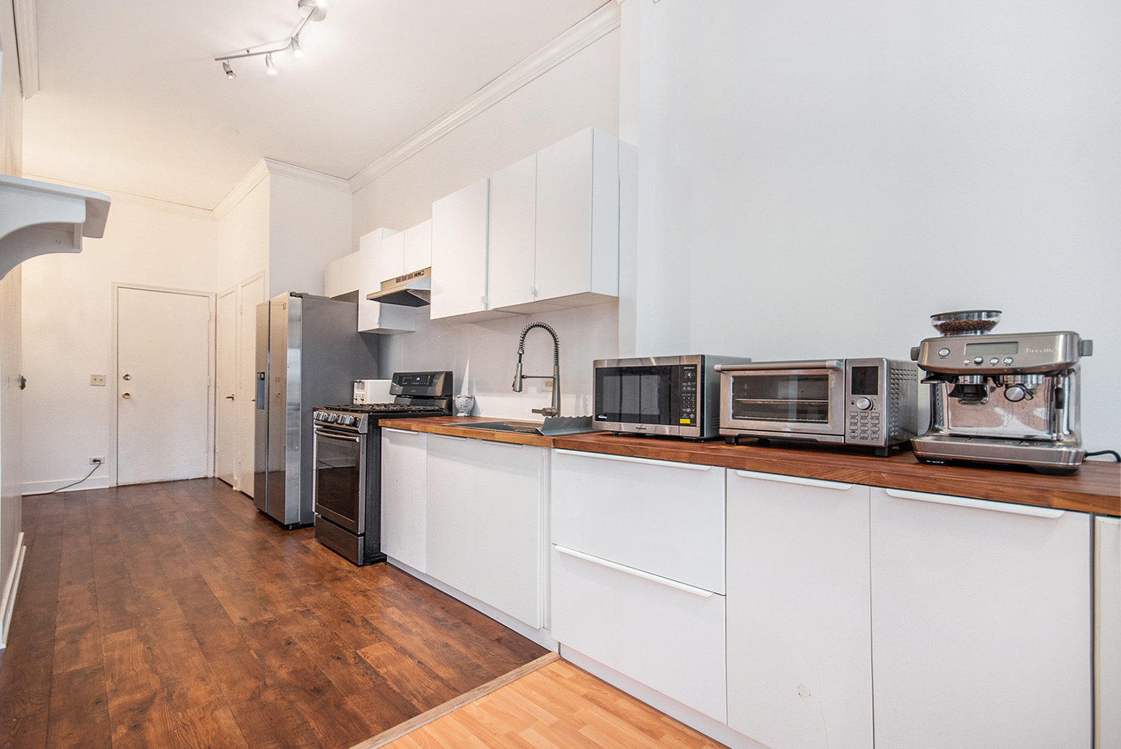 1008 Arbor Court Mount Prospect, IL 60056 - Photo 4 of 19 a kitchen with stainless steel appliances a sink and a refrigerator
