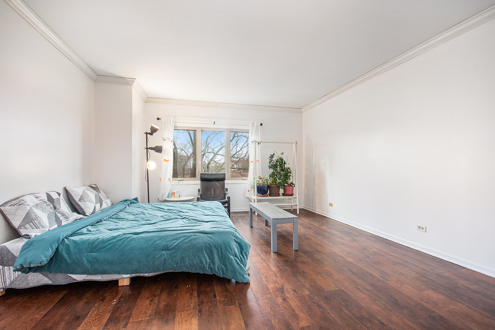 1008 Arbor Court Mount Prospect, IL 60056 - Photo 10 of 19 a bedroom with a bed and wooden floor