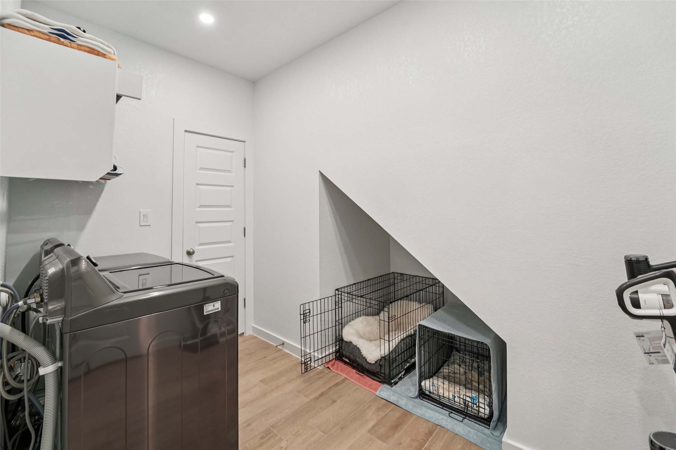 1108 Sweetspire Street Leander, TX 78641 - Photo 15 of 39 a room with storage and utility