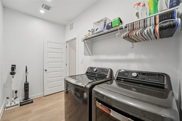 a kitchen with cabinets and window
