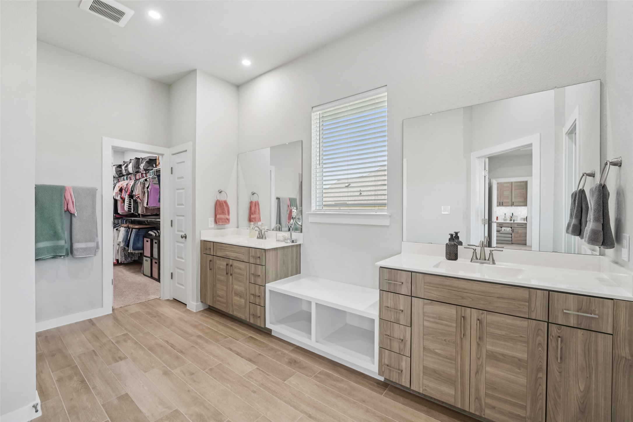 1108 Sweetspire Street Leander, TX 78641 - Photo 23 of 39 a bathroom with a sink double vanity and a tub