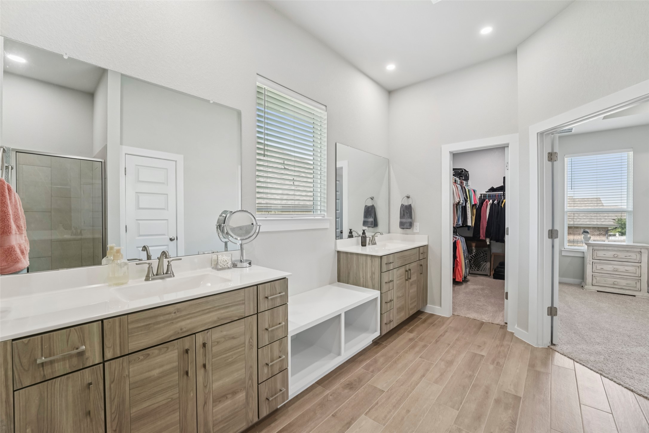 1108 Sweetspire Street Leander, TX 78641 - Photo 25 of 39 a bathroom with a double vanity sink mirror and cabinets