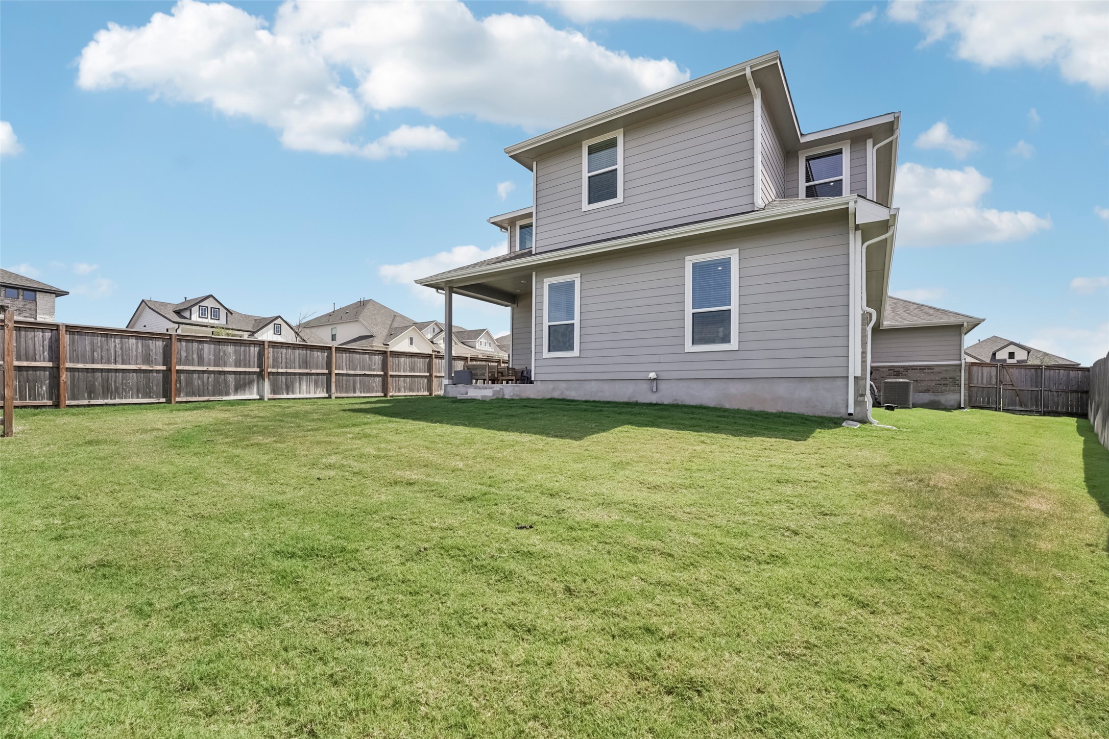1108 Sweetspire Street Leander, TX 78641 - Photo 36 of 39 a view of a house with a backyard