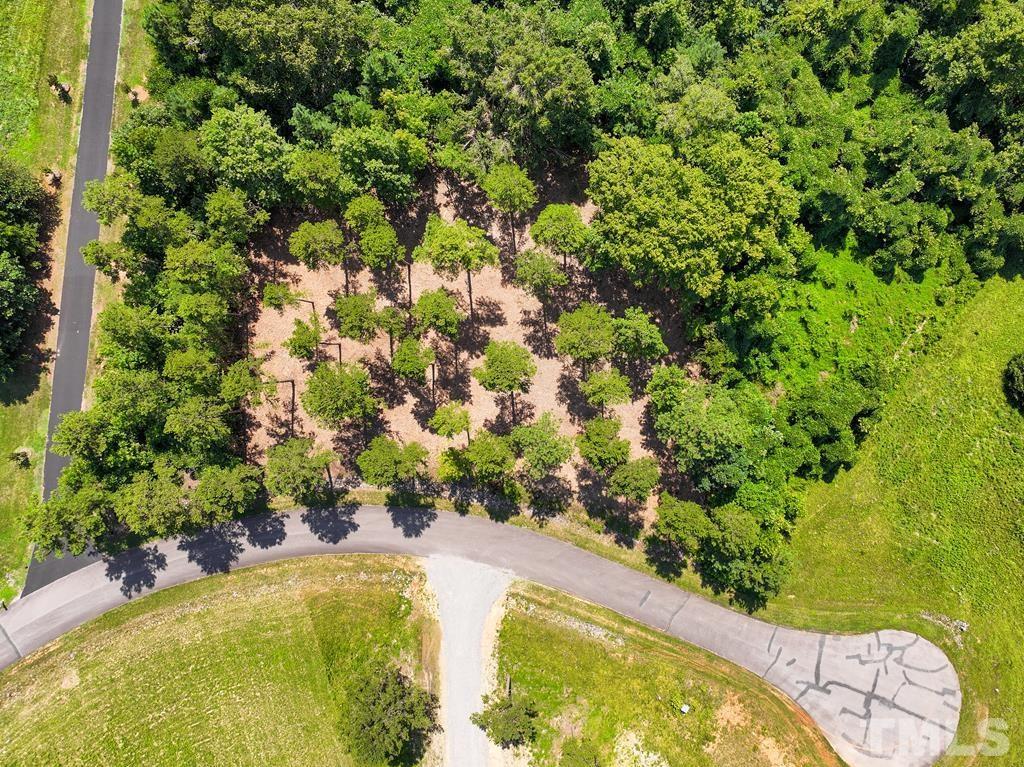 Lot 18 Grace Stone Drive Clarksville, VA 23927 - Photo 3 of 25 a view of a swimming pool from a lake view