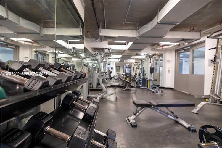 455 Northeast 25th Street, Unit 407 Miami, FL 33137 - Photo 38 of 50 a view of a room with gym equipment