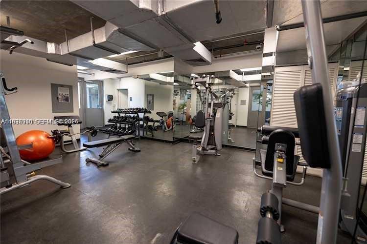 455 Northeast 25th Street, Unit 407 Miami, FL 33137 - Photo 39 of 50 a view of a room with gym equipment