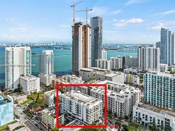 455 Northeast 25th Street, Unit 407 Miami, FL 33137 - Photo 44 of 50 a roof deck with couch