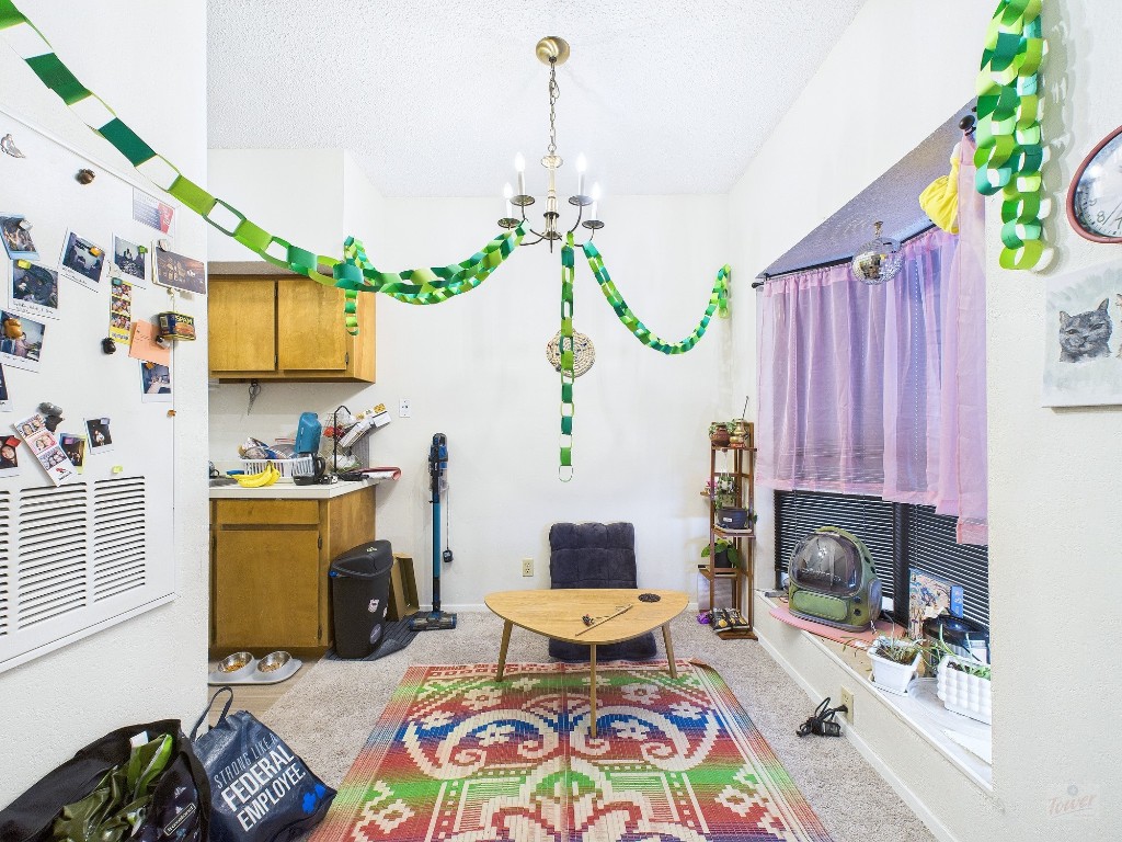 3316 Guadalupe Street, Unit 321 Austin, TX 78705 - Photo 3 of 13 a living room with furniture and a fireplace