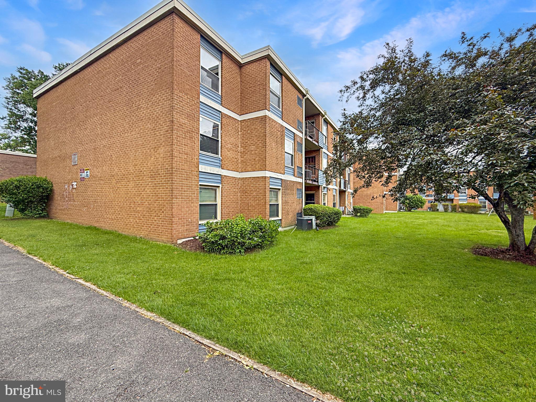 3807 St Barnabas Road, Unit 203 Suitland, MD 20746 - Photo 23 of 23 Charming brick apartment complex exterior.