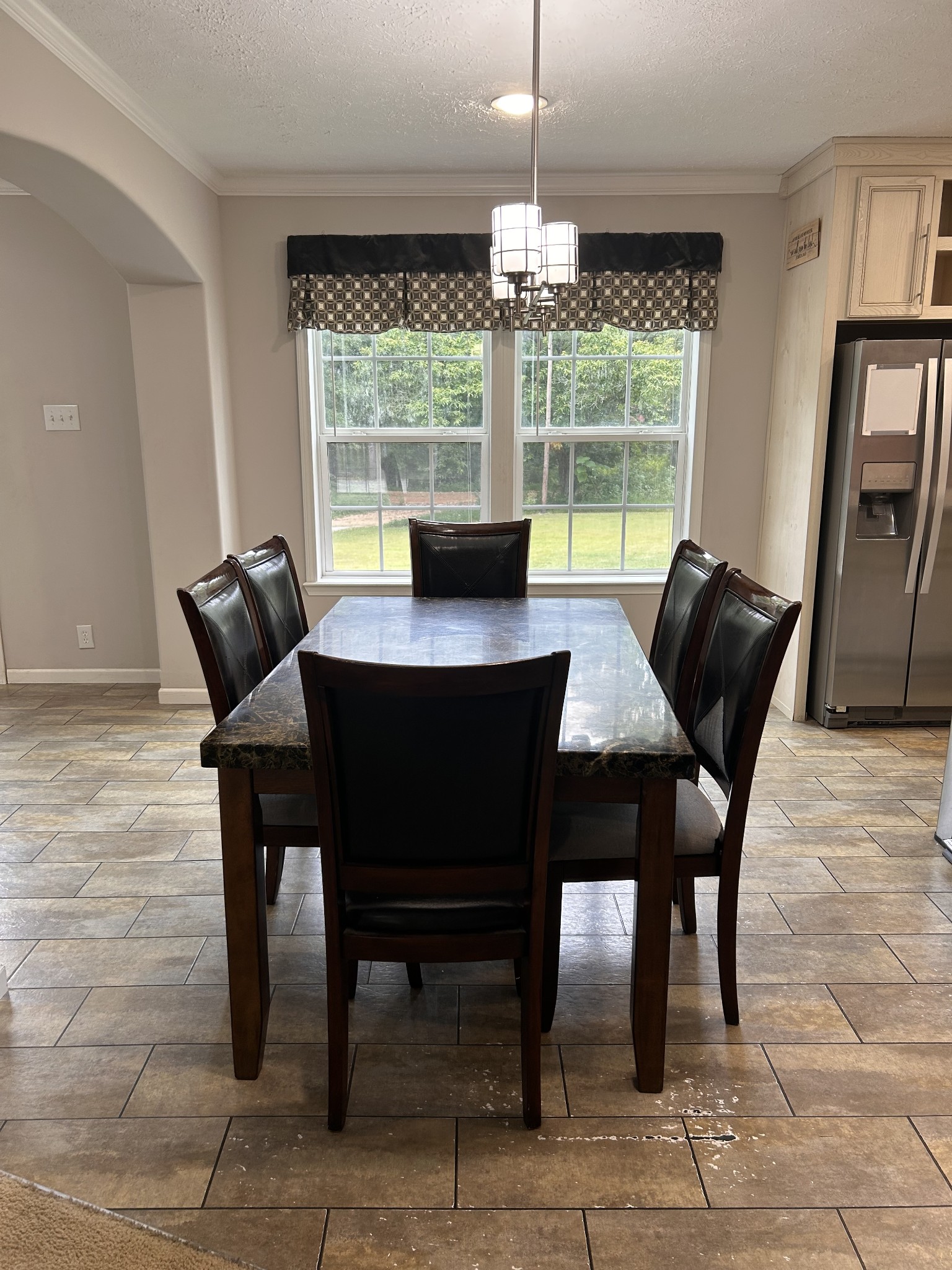 7111 Wink Parker Road Lyles, TN 37098 - Photo 14 of 47 a view of a dining room with furniture window and outside view