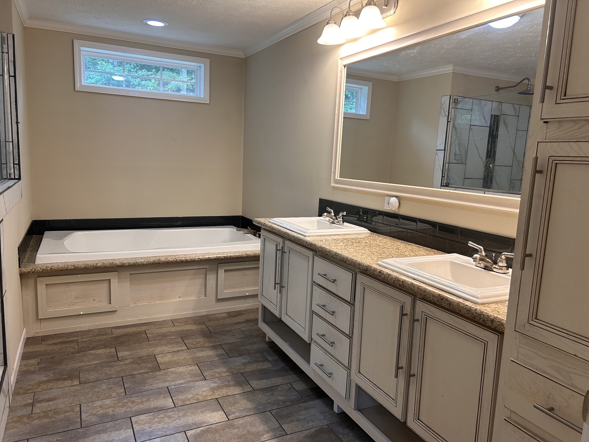7111 Wink Parker Road Lyles, TN 37098 - Photo 24 of 47 a bathroom with a sink and a mirror