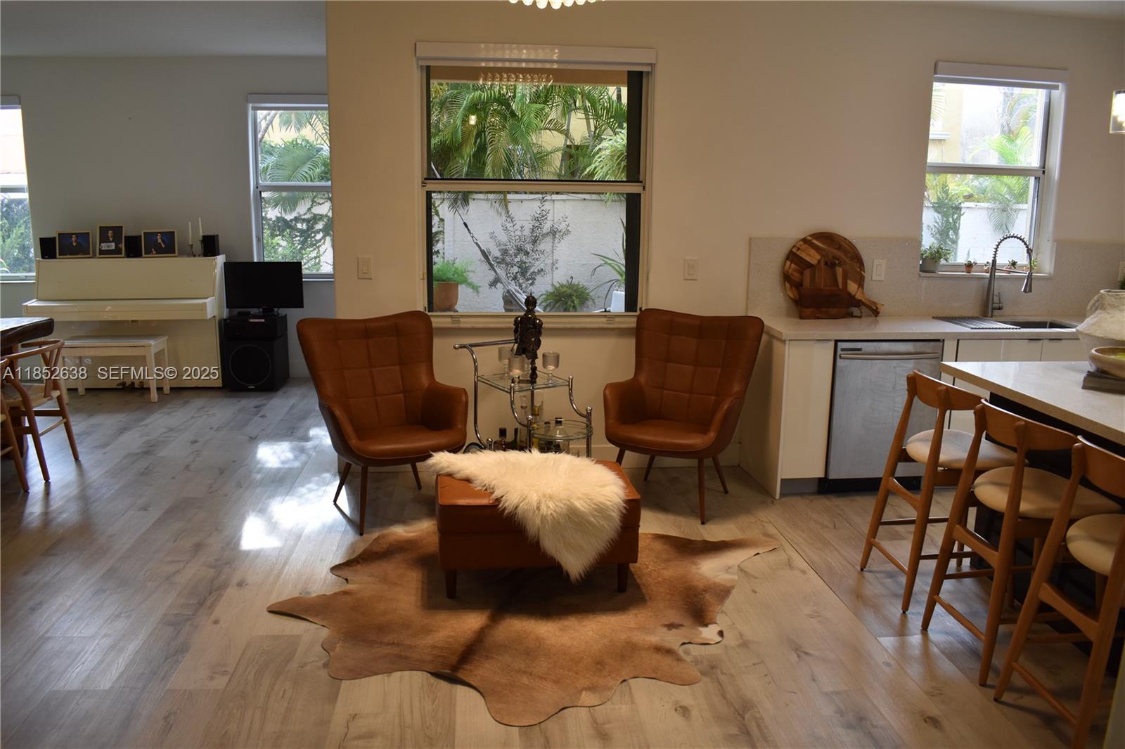 5189 Northwest 108th Path Doral, FL 33178 - Photo 3 of 23 a living room with furniture and a window