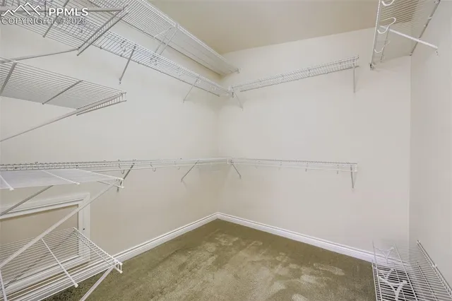a view of a room with racks on the wall