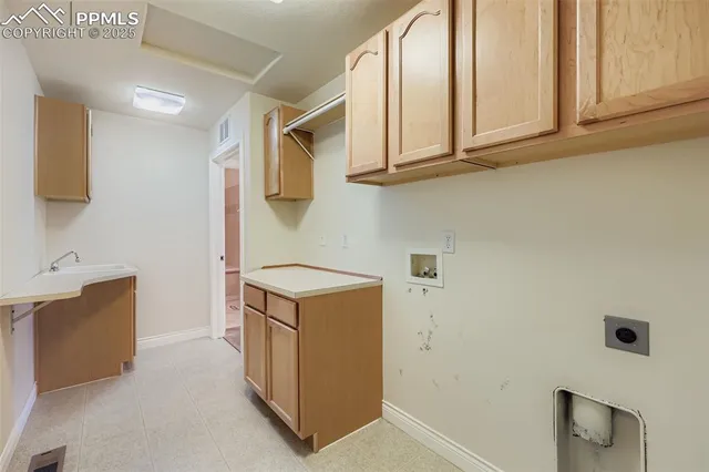 a view of cabinets with wooden floor