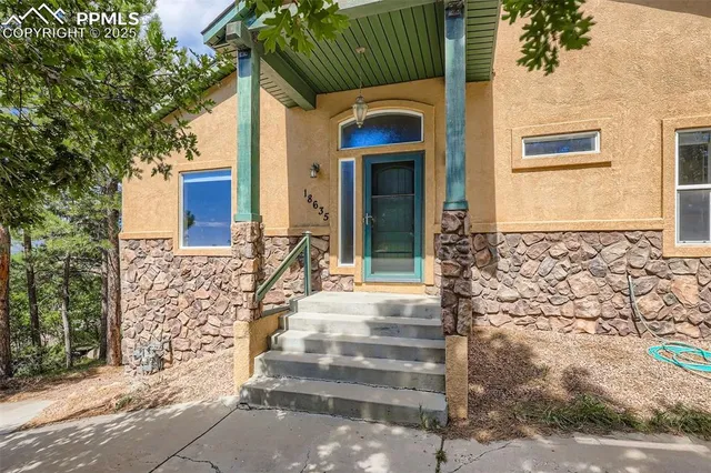 a front view of a house with a outdoor space