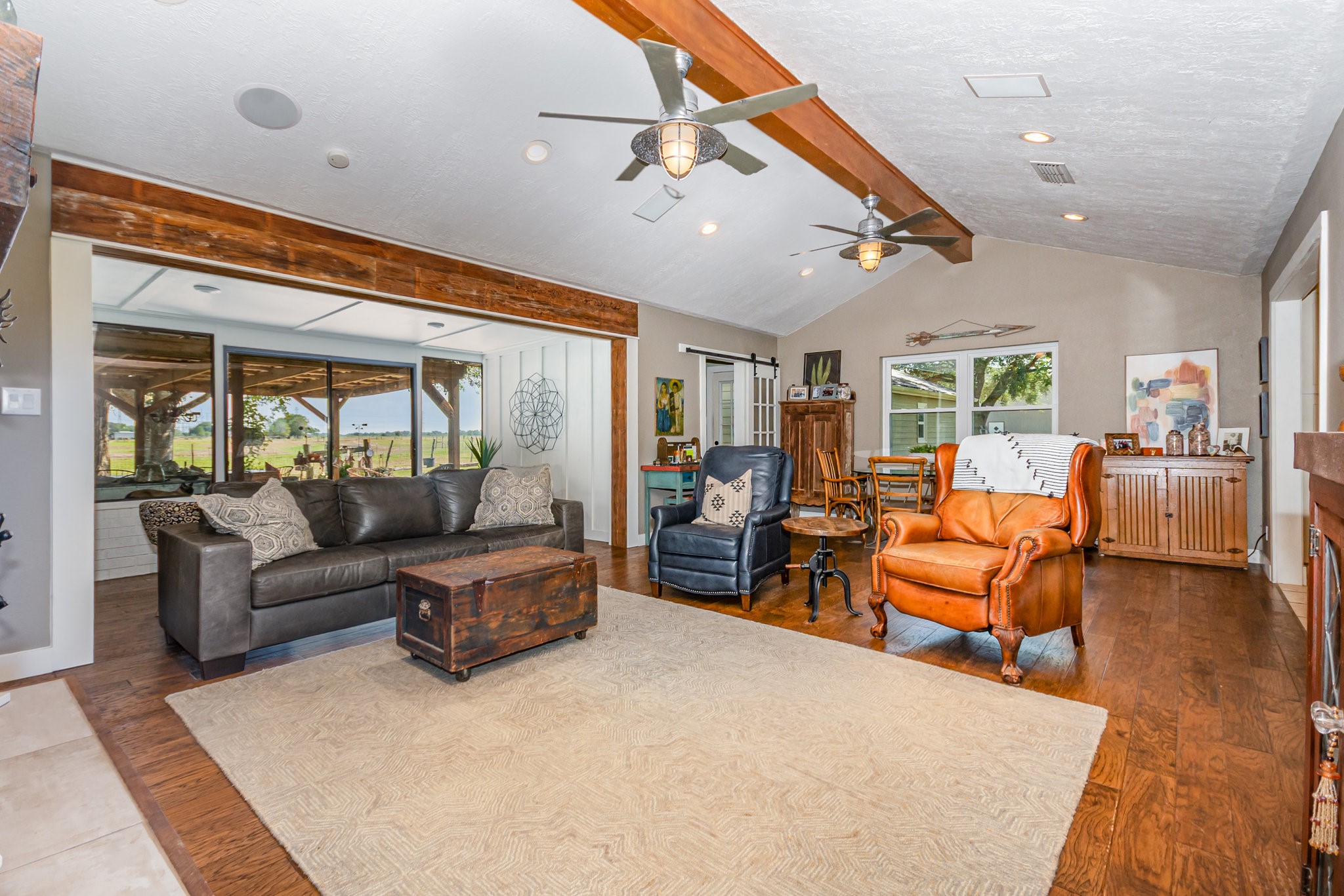 12009 Dannhaus Road Needville, TX 77461 - Photo 14 of 49 a living room with furniture and a large window