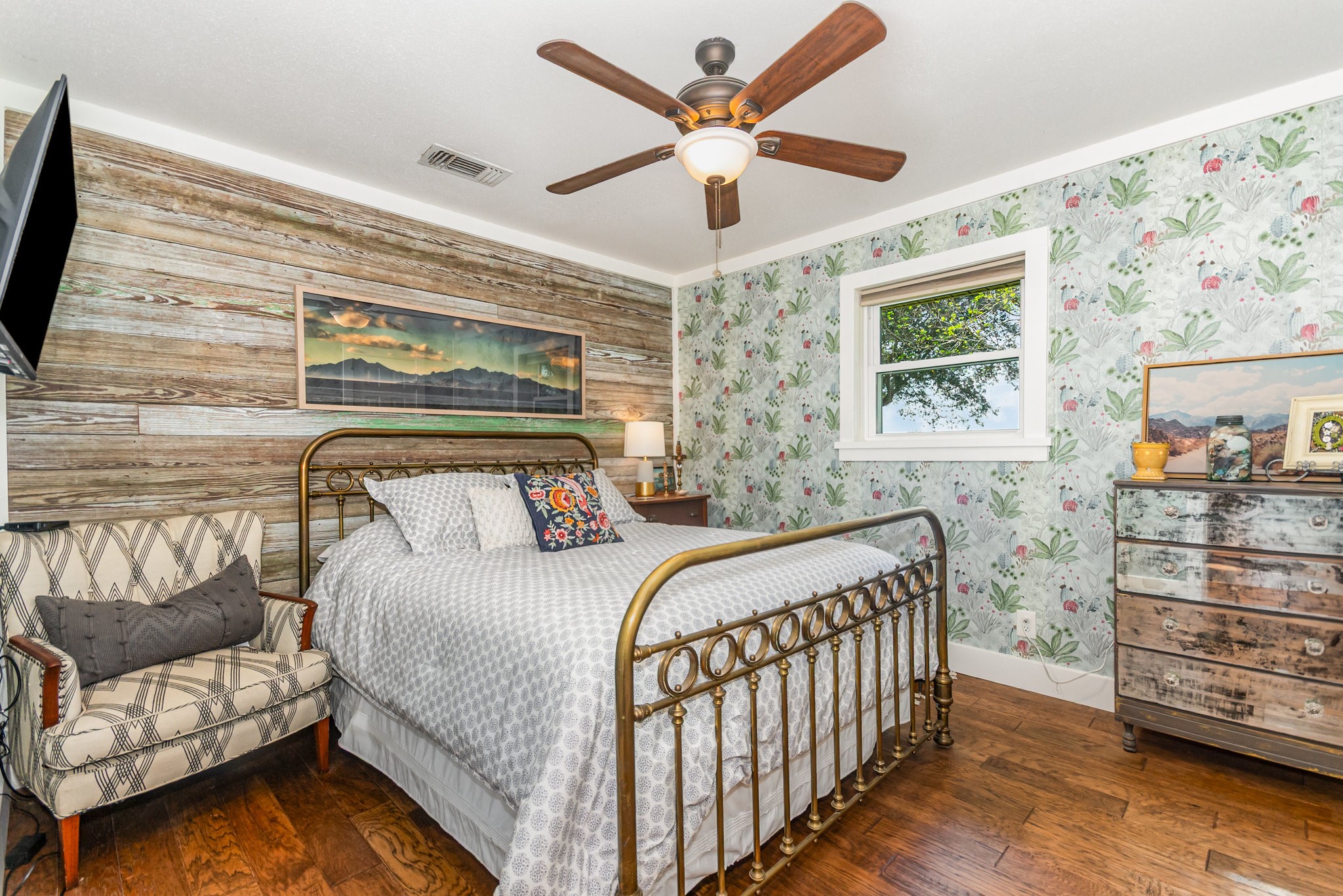 12009 Dannhaus Road Needville, TX 77461 - Photo 19 of 49 a bedroom with a bed and a couch