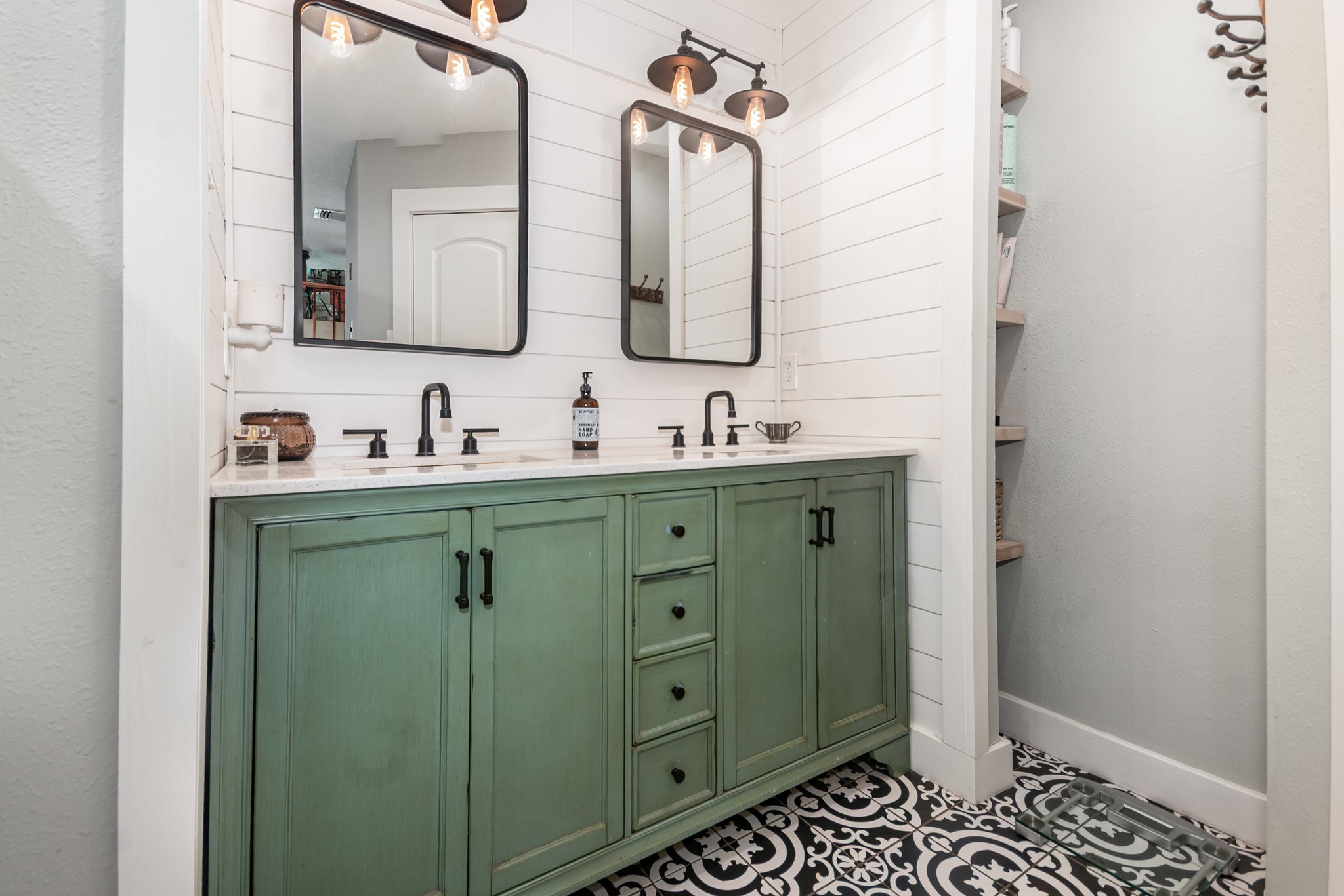 12009 Dannhaus Road Needville, TX 77461 - Photo 23 of 49 a bathroom with double vanity sink and a mirror