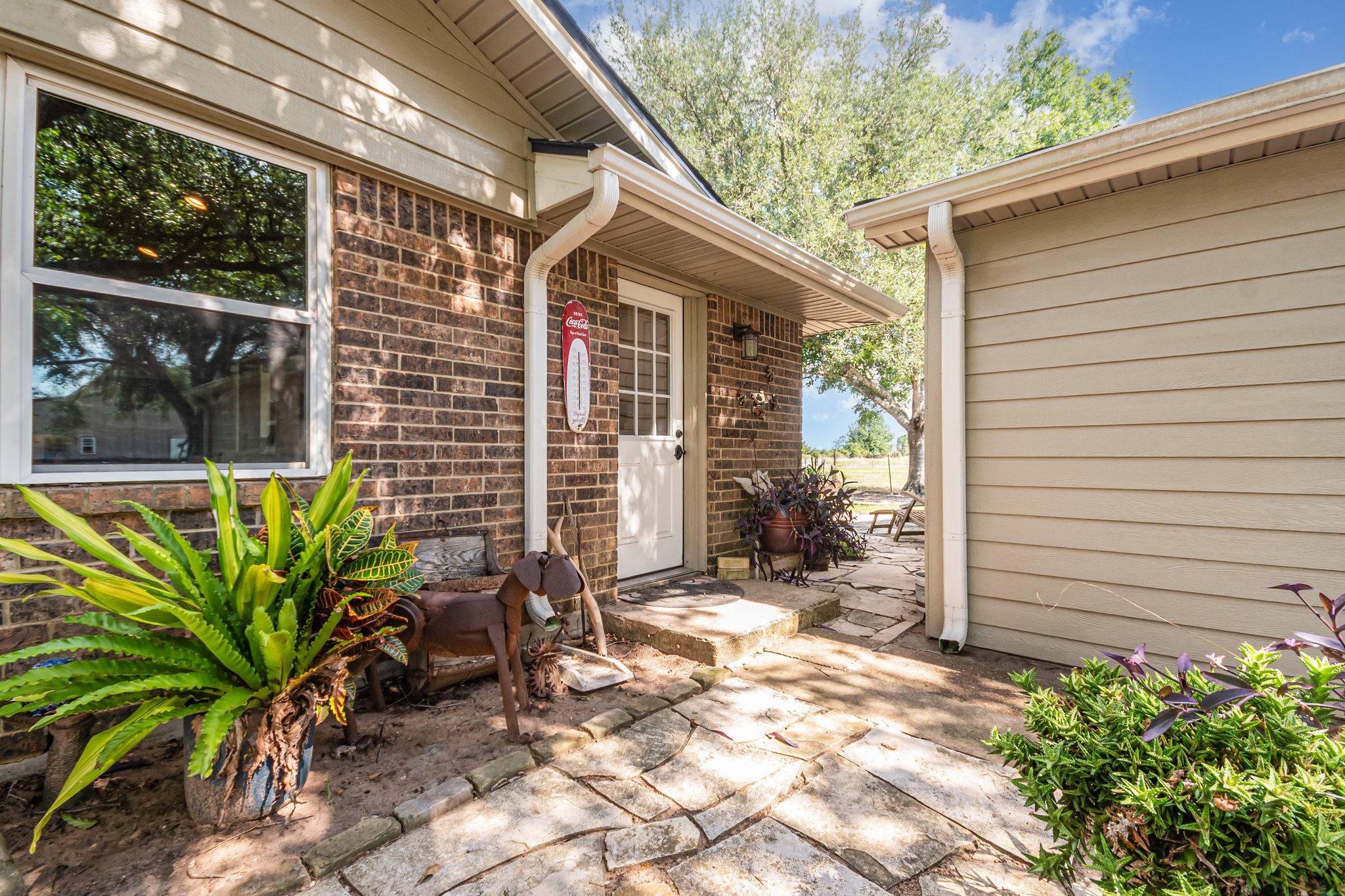 12009 Dannhaus Road Needville, TX 77461 - Photo 27 of 49 a view of a porch with patio