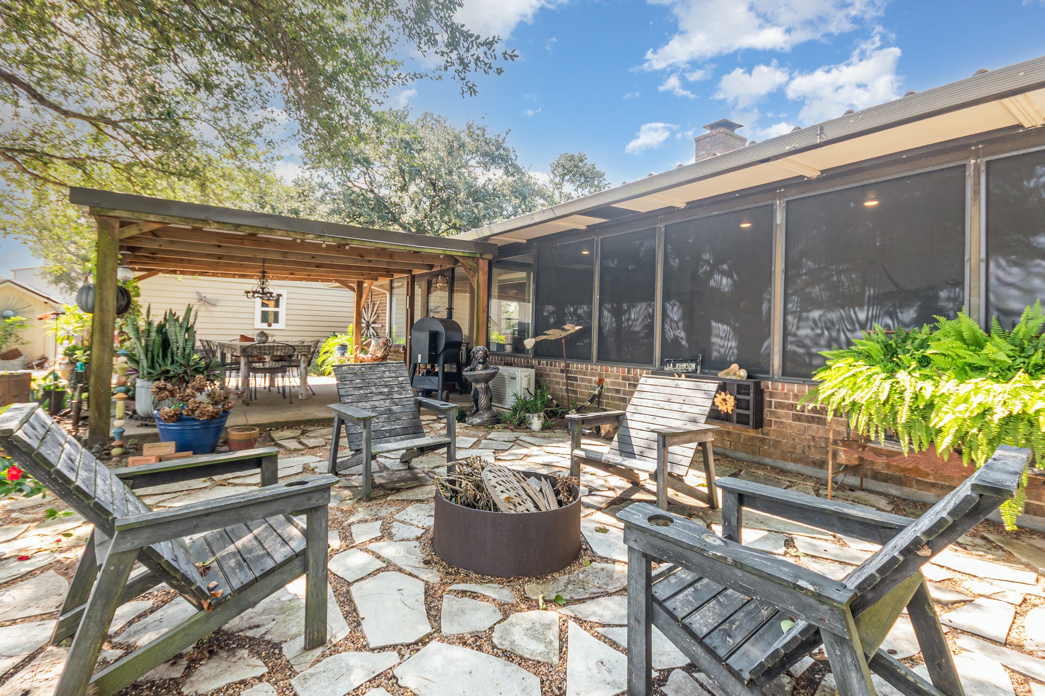 12009 Dannhaus Road Needville, TX 77461 - Photo 31 of 49 a view of balcony with chairs and tables