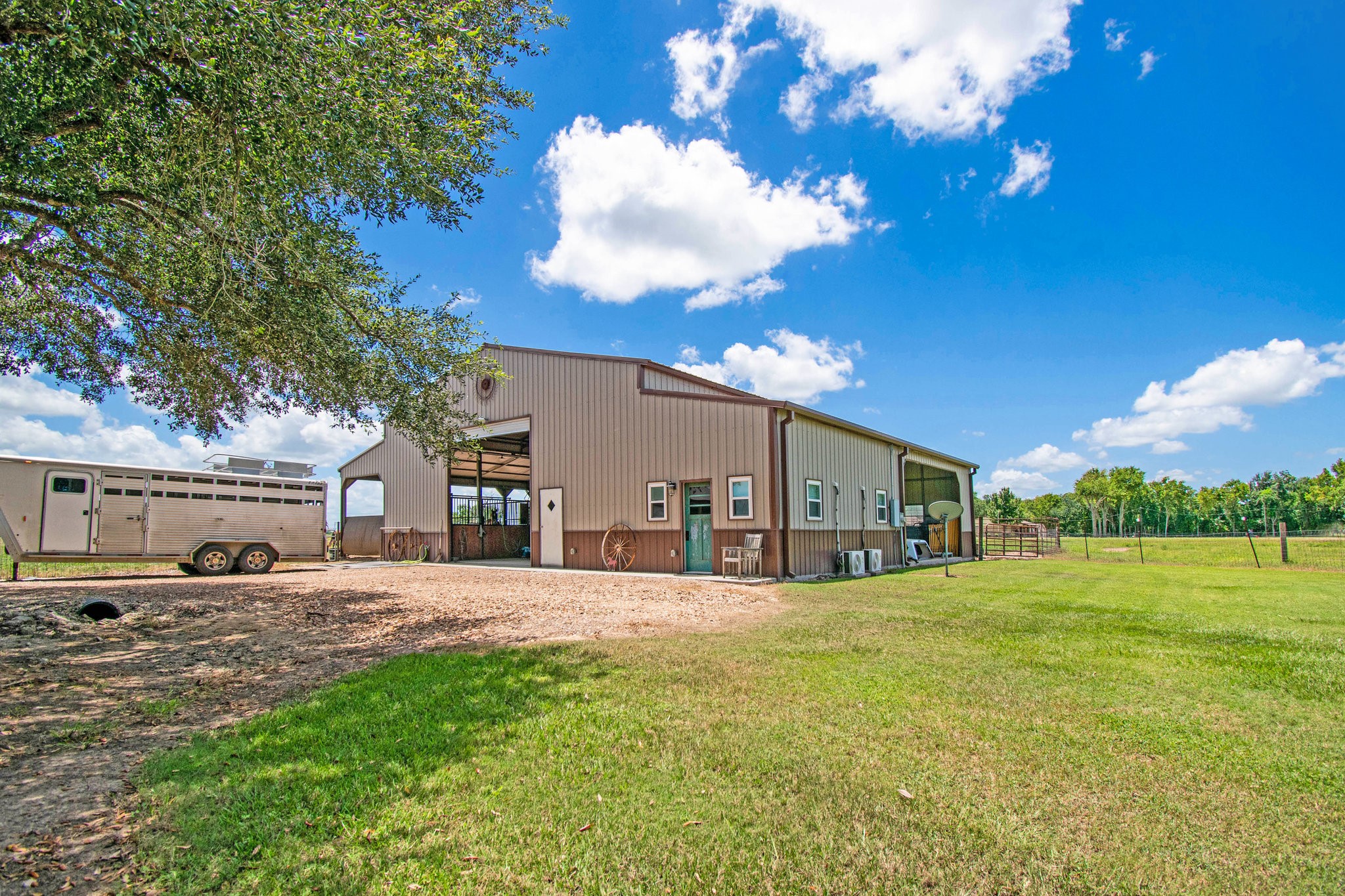 12009 Dannhaus Road Needville, TX 77461 - Photo 34 of 49 a view of a house with a yard