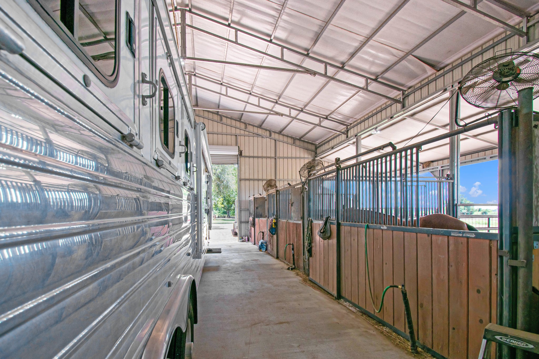 12009 Dannhaus Road Needville, TX 77461 - Photo 37 of 49 a view of a pathway of a building