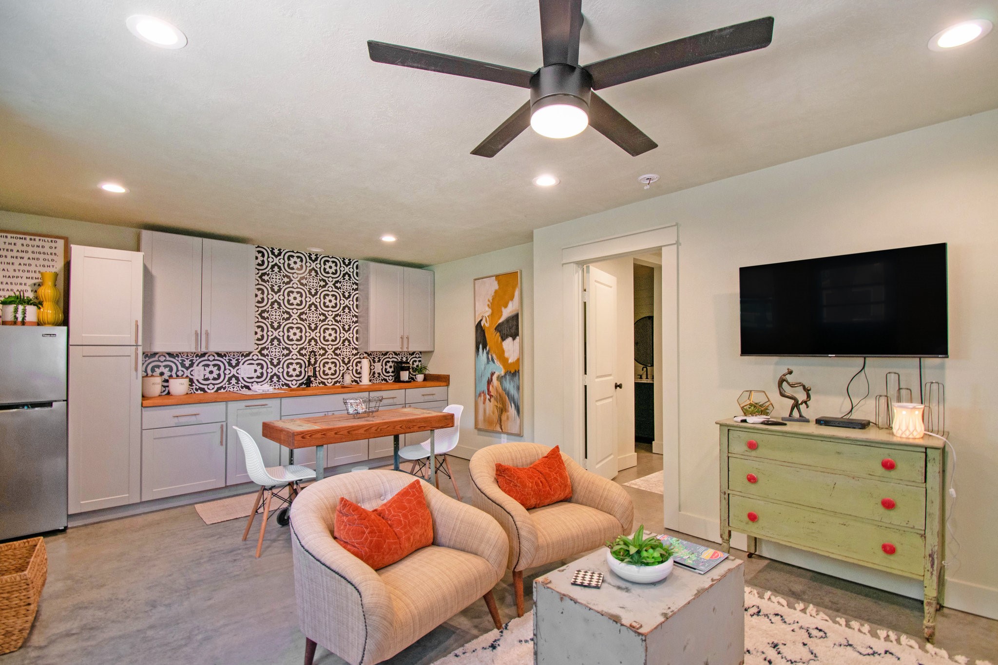 12009 Dannhaus Road Needville, TX 77461 - Photo 39 of 49 a living room with furniture and a flat screen tv
