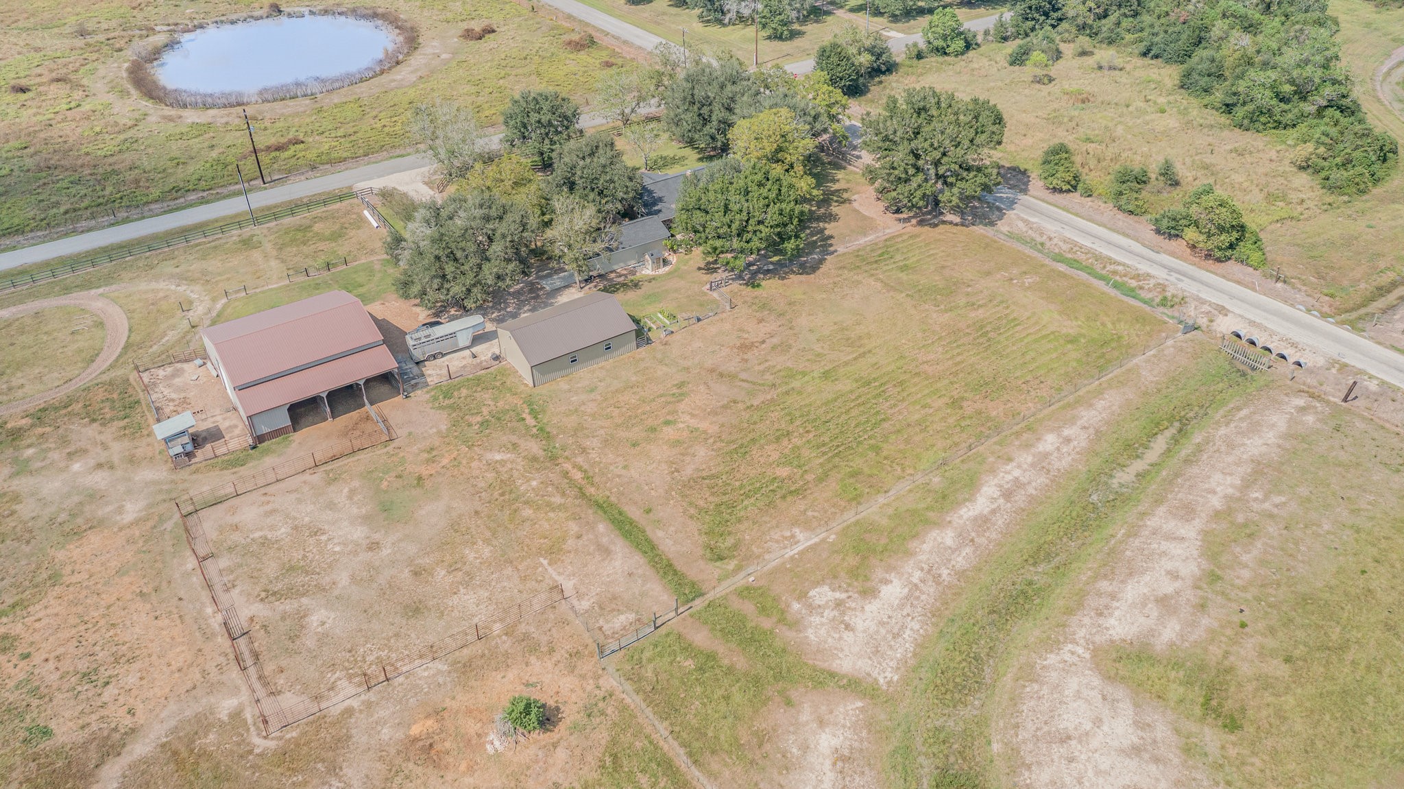 12009 Dannhaus Road Needville, TX 77461 - Photo 45 of 49 a view of a backyard of a house