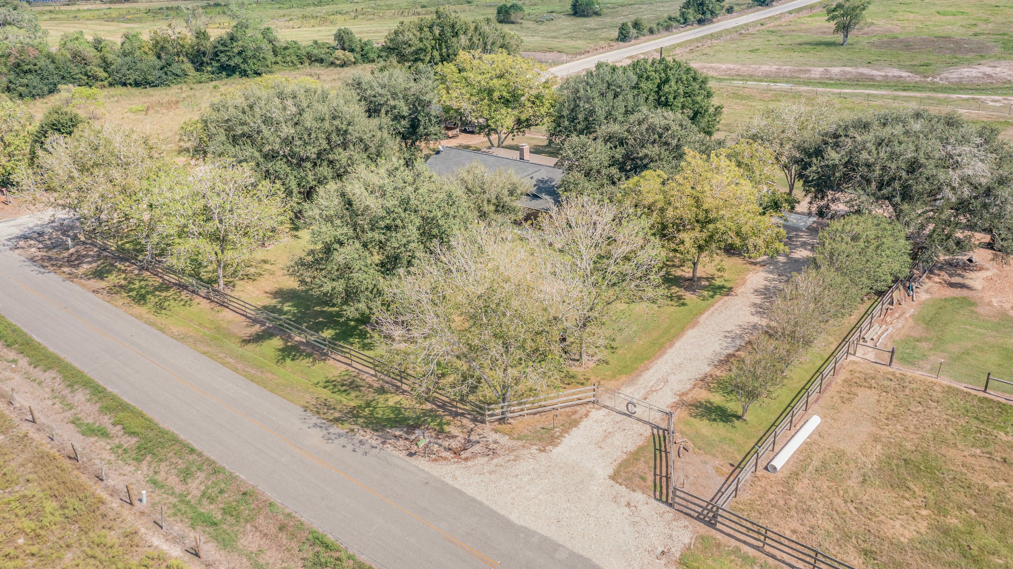 12009 Dannhaus Road Needville, TX 77461 - Photo 46 of 49 a view of a yard with an outdoor space