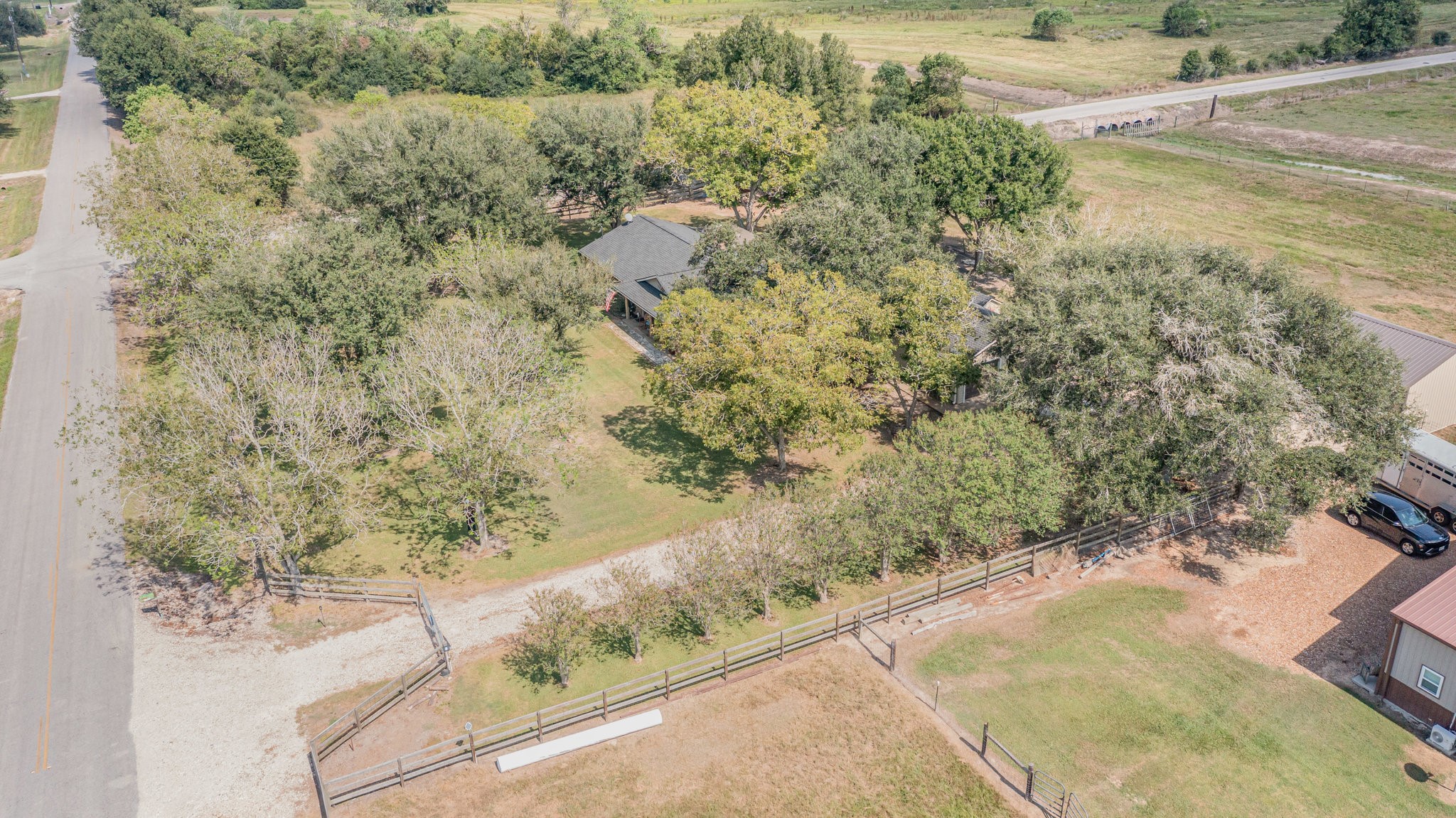 12009 Dannhaus Road Needville, TX 77461 - Photo 47 of 49 a view of a lot of a yard and trees