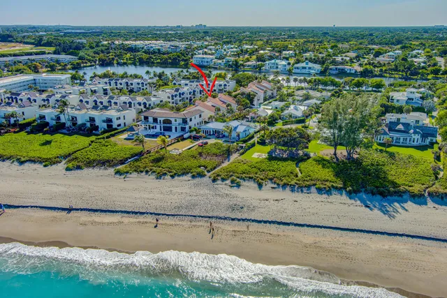 an aerial view of a houses with outdoor space
