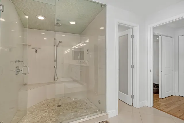 a bedroom with a bed and a table