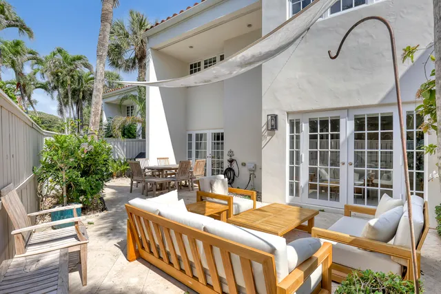 a view of balcony with furniture