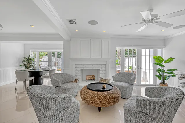 a kitchen with stainless steel appliances granite countertop a sink a stove a microwave and wooden cabinets