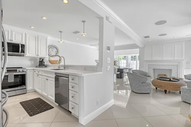 a bedroom with a large bed and a couch