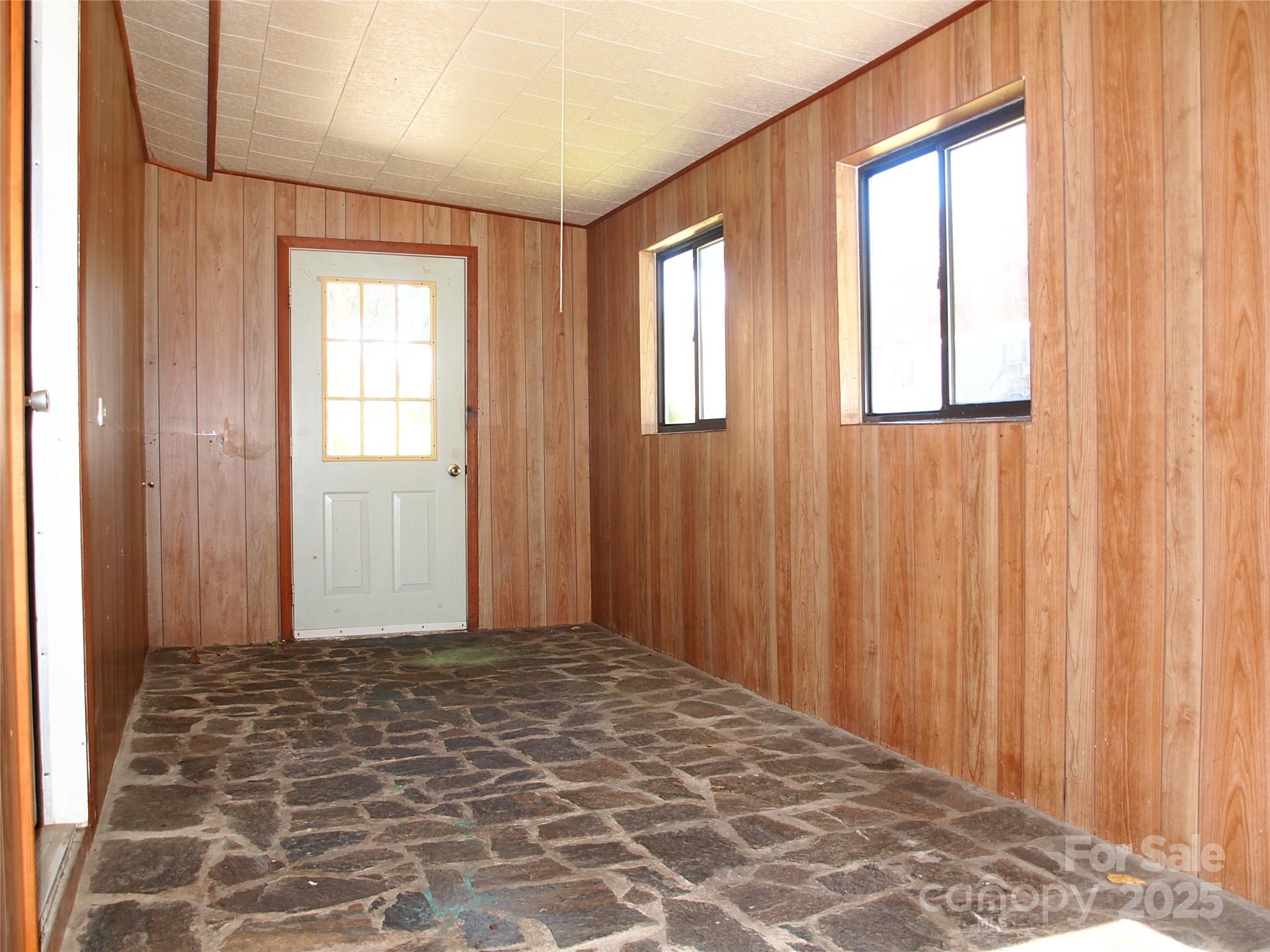 9 Smokey Cove Road Canton, NC 28716 - Photo 13 of 24 a view of empty room with windows